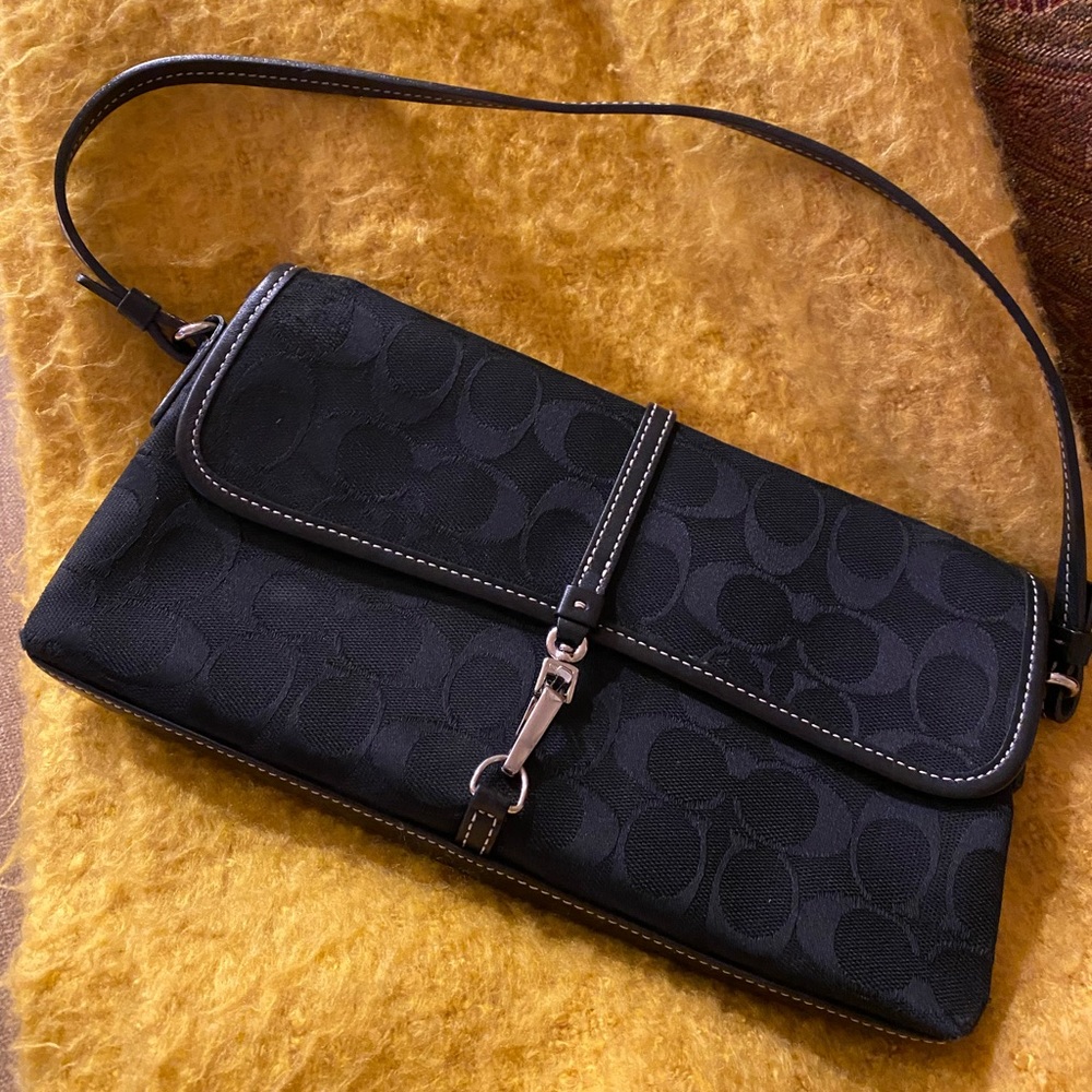 Black leather Coach handbag. Excellent condition  great handbag day to night.